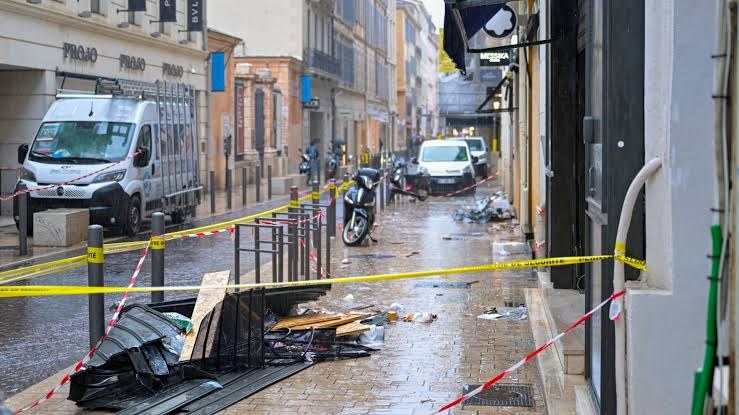 Police tape and debris on a street in France after the riots