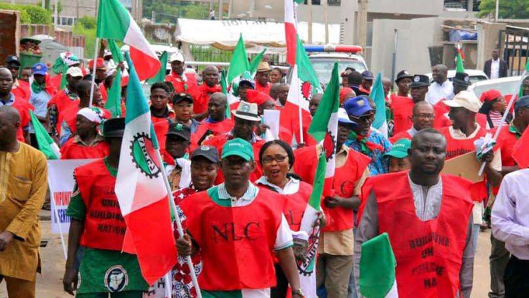 NLC members marching with union flags
