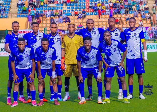 Doma United players lined up before a match